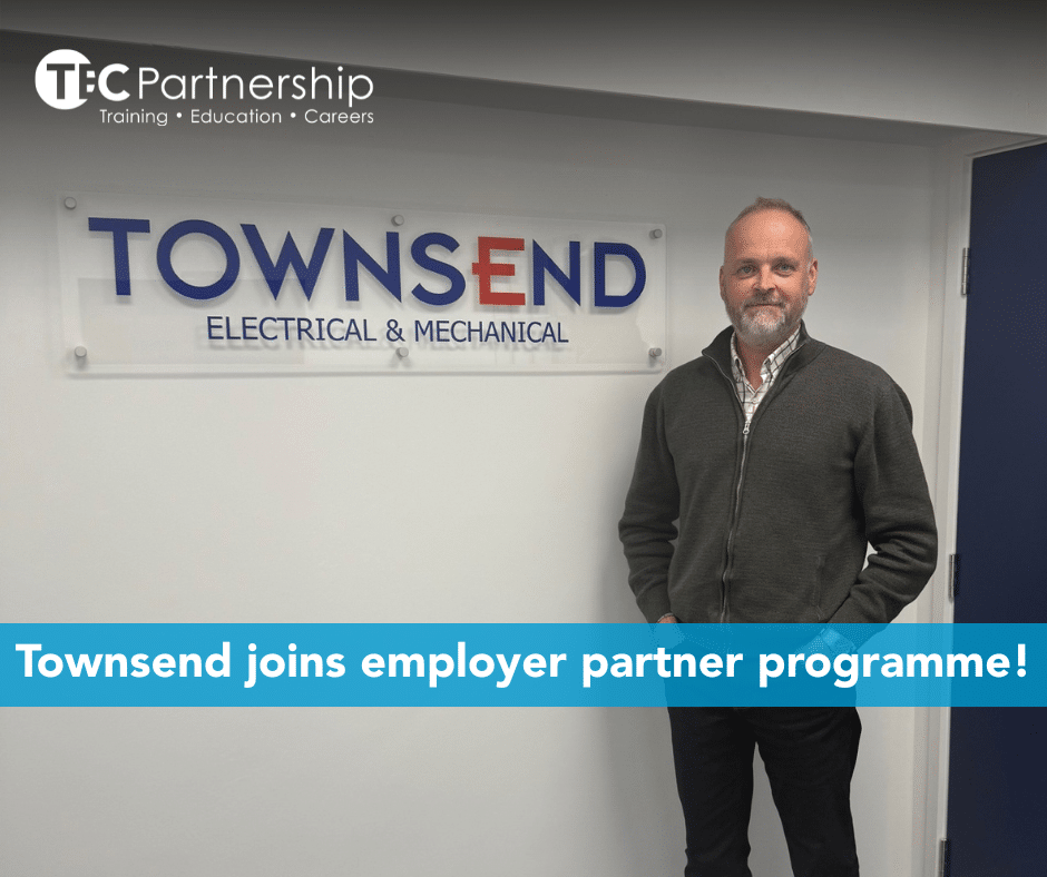 Paul Huntley standing in from of the indoors Townsend sign. Blue box: Townsend joins employer partner programme! TEC Partnership logo top left Townsen